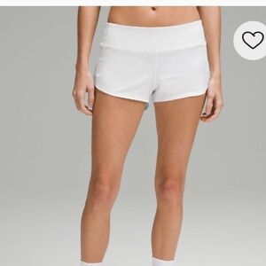 Size 6 Lululemon speed up low rise lined white shorts. 2.5”